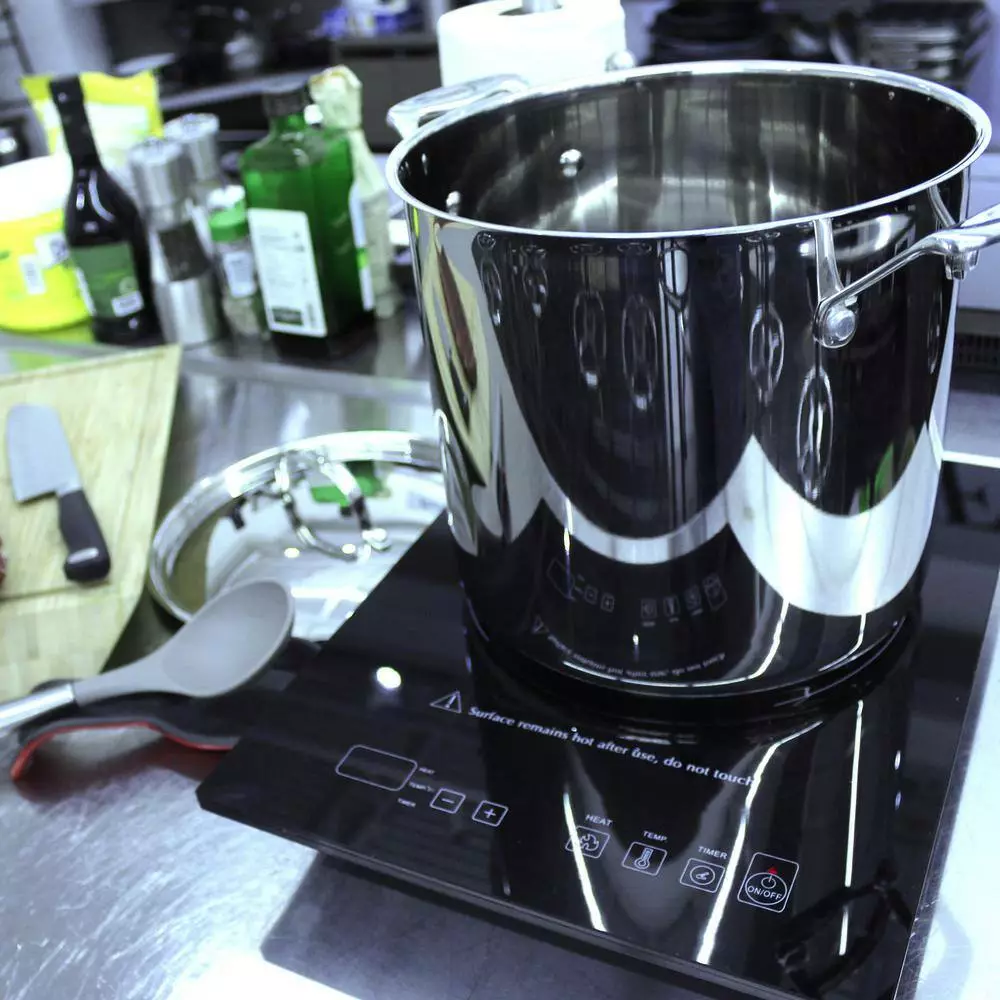 EarthChef Premium 10 qt. Stainless Steel Stock Pot with Lid by BergHOFF 7 EarthChef Premium 10 qt. Stainless Steel Stock Pot with Lid by BergHOFF - Image 5