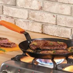 12 in. Carbon Steel Skillet in Black with Comfort Grip Handle by Lodge 7 12 in. Carbon Steel Skillet in Black with Comfort Grip Handle by Lodge -Cookware Sales Shop black lodge skillets crs12hh61 40 1000