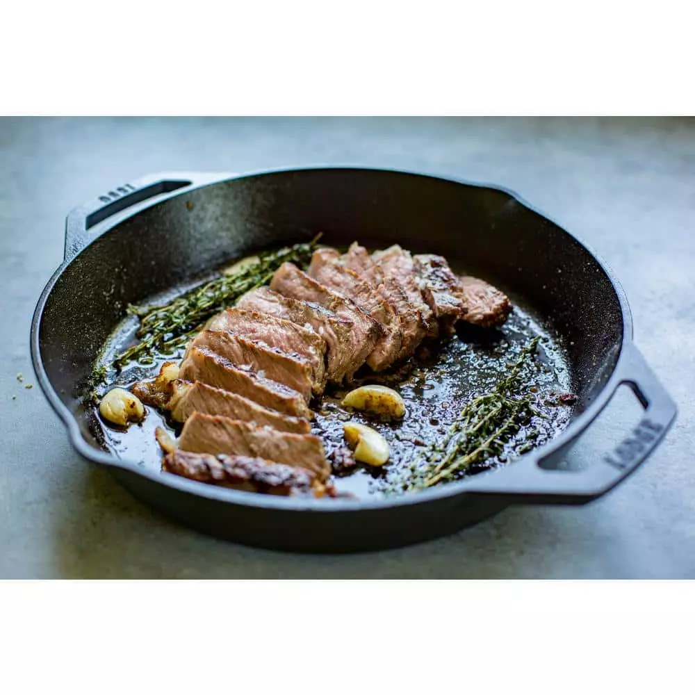 12 in. Cast Iron Skillet in Black with Dual Handles by Lodge 6 12 in. Cast Iron Skillet in Black with Dual Handles by Lodge - Image 4