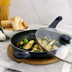 Anetta 3.5 qt. Nonstick Aluminum Saute Pan with Lid in Navy Blue by Oster 13 Anetta 3.5 qt. Nonstick Aluminum Saute Pan with Lid in Navy Blue by Oster -Cookware Sales Shop navy oster saute pans 985117242m fa 1000