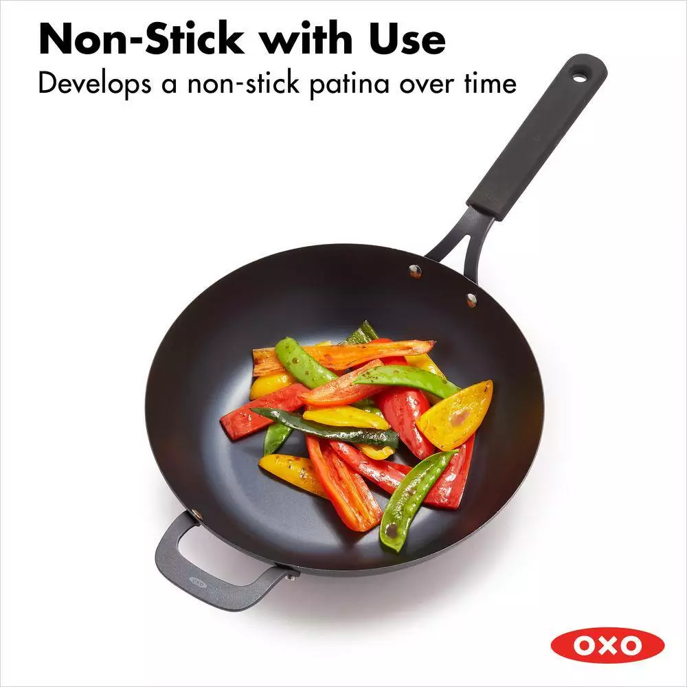 Obsidian 12 in. Pre-Seasoned Carbon Steel Induction Safe Wok with Silicone Sleeve and Helper Handle in Black by OXO 6 Obsidian 12 in. Pre-Seasoned Carbon Steel Induction Safe Wok with Silicone Sleeve and Helper Handle in Black by OXO - Image 4