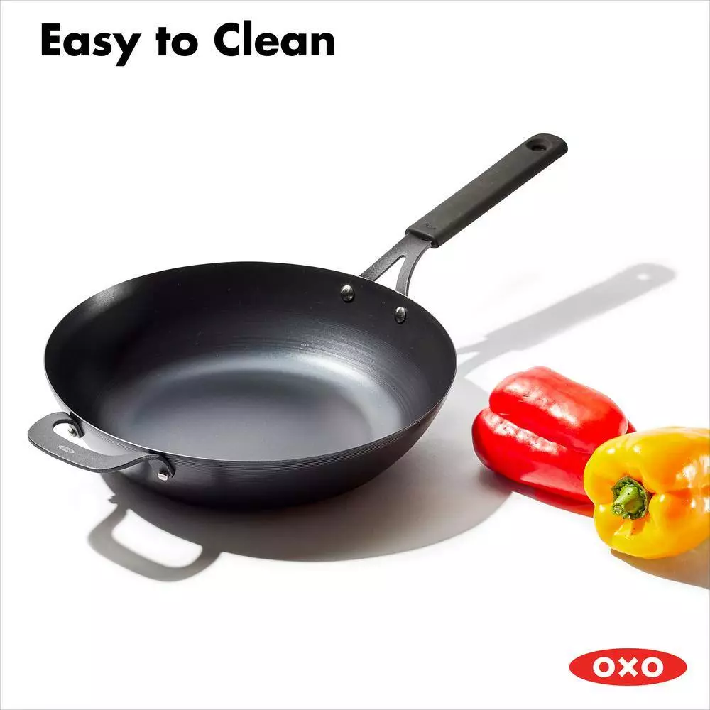 Obsidian 12 in. Pre-Seasoned Carbon Steel Induction Safe Wok with Silicone Sleeve and Helper Handle in Black by OXO 10 Obsidian 12 in. Pre-Seasoned Carbon Steel Induction Safe Wok with Silicone Sleeve and Helper Handle in Black by OXO - Image 8