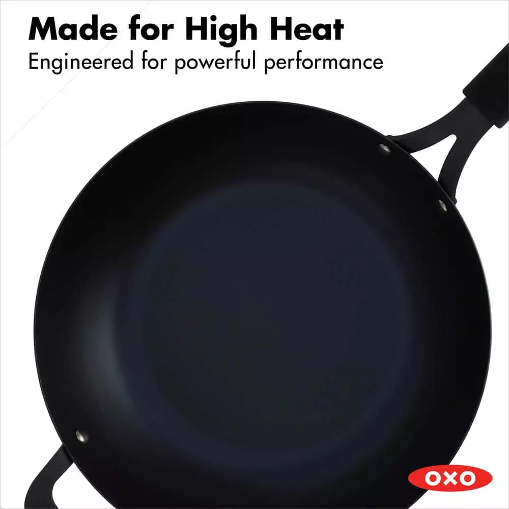 Obsidian 12 in. Pre-Seasoned Carbon Steel Induction Safe Wok with Silicone Sleeve and Helper Handle in Black by OXO 9 Obsidian 12 in. Pre-Seasoned Carbon Steel Induction Safe Wok with Silicone Sleeve and Helper Handle in Black by OXO - Image 7