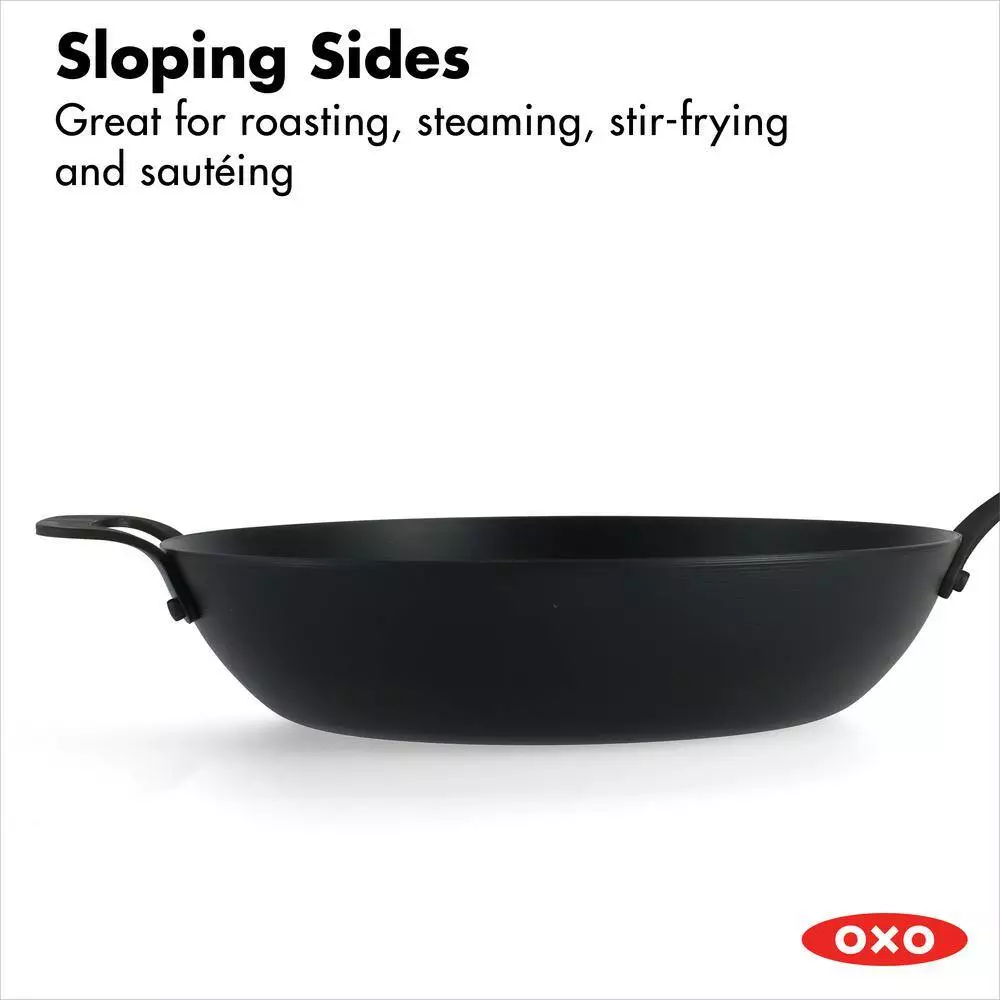 Obsidian 12 in. Pre-Seasoned Carbon Steel Induction Safe Wok with Silicone Sleeve and Helper Handle in Black by OXO 8 Obsidian 12 in. Pre-Seasoned Carbon Steel Induction Safe Wok with Silicone Sleeve and Helper Handle in Black by OXO - Image 6