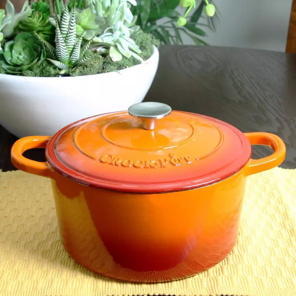 Artisan 5 qt. Round Cast Iron Nonstick Dutch Oven in Sunset Orange with Lid by Crock-Pot 6 Artisan 5 qt. Round Cast Iron Nonstick Dutch Oven in Sunset Orange with Lid by Crock-Pot - Image 4