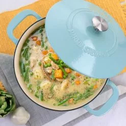 7 qt. Round Turquoise Enameled Cast Iron Dutch Oven with Lid by MARTHA STEWART 15 7 qt. Round Turquoise Enameled Cast Iron Dutch Oven with Lid by MARTHA STEWART -Cookware Sales Shop turquoise dutch ovens 985117931m 76 1000